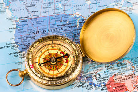 A map of the USA with a compass laid over itの写真素材