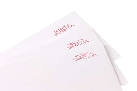 Three letters all of which are marked private and confidentialの写真素材