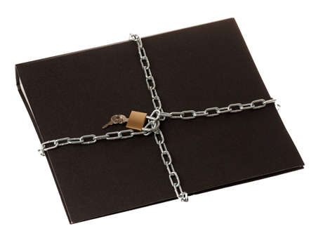 A black ring binder with a chain and padlock around it.の写真素材