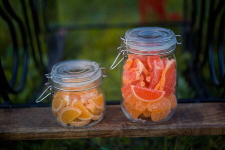 Fruit jelly slices in jarsの写真素材
