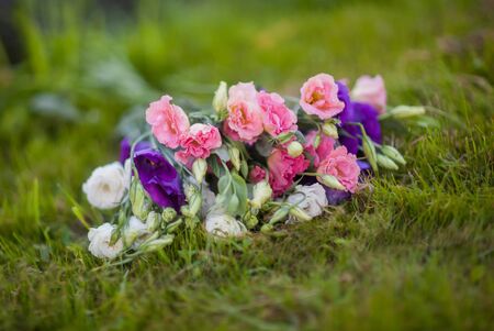 Tender bouquet of Eustoma on the green grassの写真素材