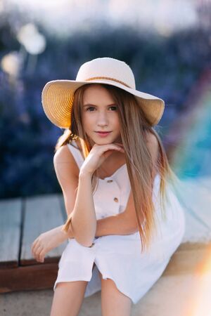 Portrait of serious little girl, young model, in open airの写真素材