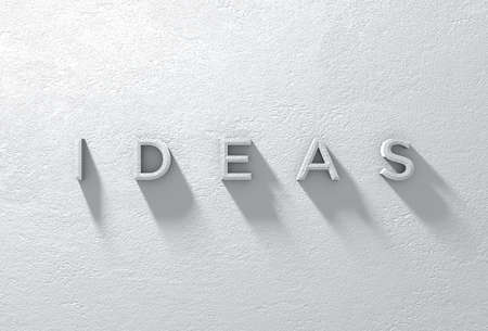 A 3d rendered sign of the word IDEAS on a dramatically lit whte textured wall.の写真素材