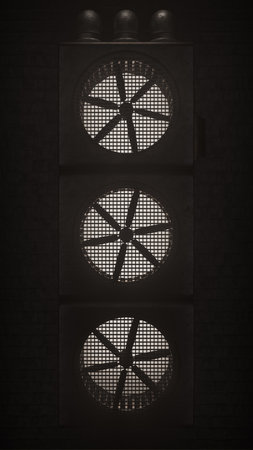 Dark grungy metal industrial fans stacked on a brick wall with light haze.の写真素材