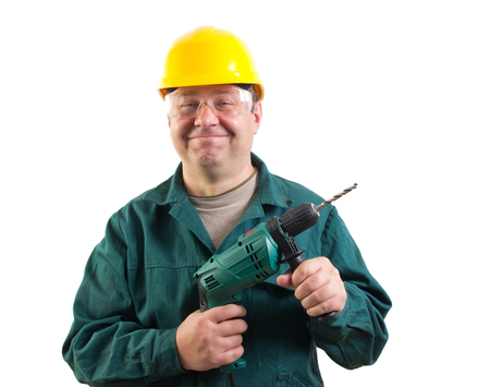 Funny workman with a drill, isolated on white background with clipping path includedの写真素材