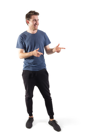 handsome young man pointing, clipping path includedの写真素材