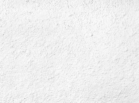 Rough white plaster wall backgroundの写真素材