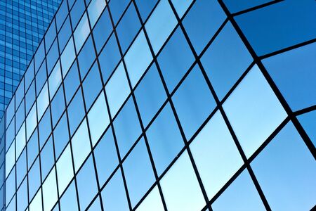Blue windows of a modern office buildingの写真素材