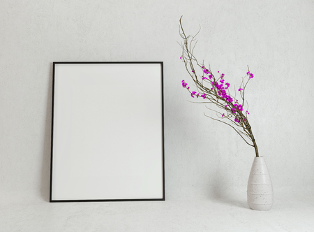 Blank poster mockup with decorative flowers of cherry sakura. 3D render illustrationの写真素材