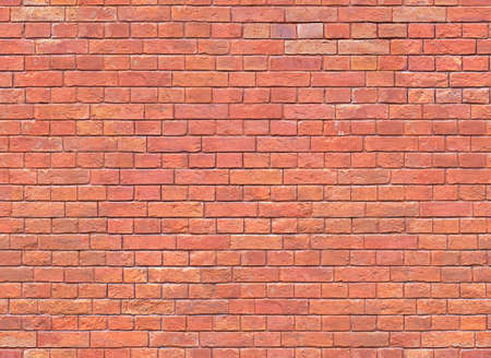 Seamless red brick wall texture. Brick wall wallpaper. Texture pattern for continuous replicate.の写真素材