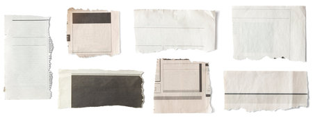 Set of torn pieces of newspaper isolated on white background.