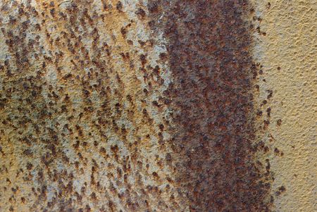 Eaten away with rust - backgroundの写真素材