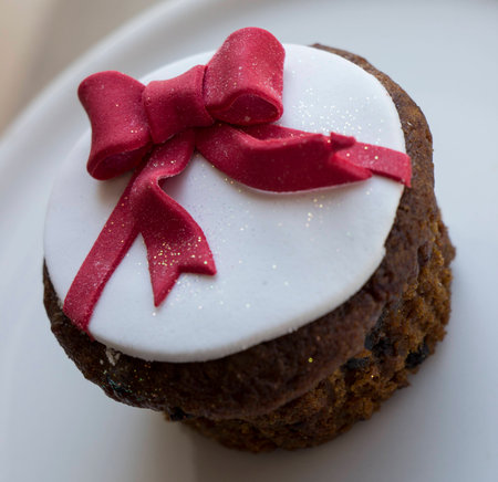 Christmas ribbon fruitcakeの写真素材