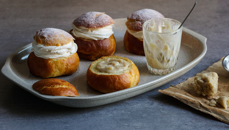 Semla or semlor, vastlakukkel, laskiaispulla is a traditional sweet roll made in various forms in Sweden, Finland, Estonia, Norway, Denmark, especially Shrove Monday and Shrove Tuesdayの写真素材