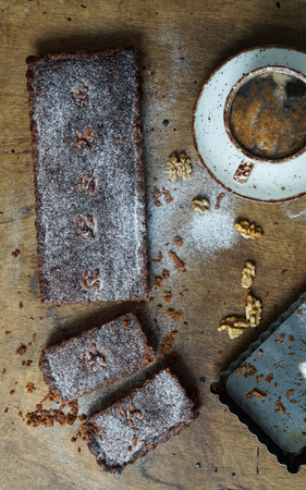 walnut frangipane tart, top view, dark vintageの写真素材