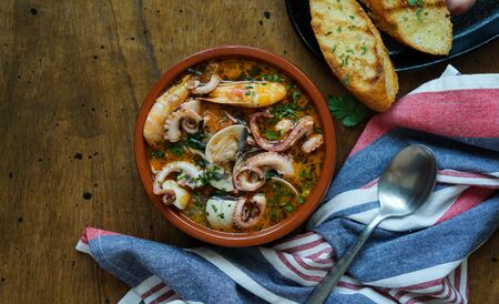 Spanish seafood stew, traditional northern meal, Caldereta or Zarzuelaの写真素材