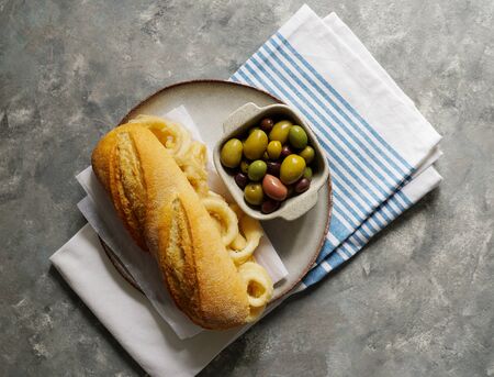 bocadillo con calamares or squid sandwich with beer, very popular in Madrid spanish typical tapasの写真素材