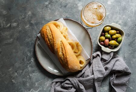 bocadillo con calamares or squid sandwich with beer, very popular in Madrid spanish typical tapasの写真素材