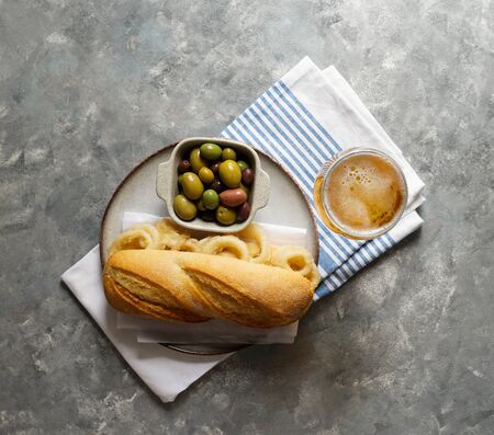bocadillo con calamares or squid sandwich with beer, very popular in Madrid spanish typical tapasの写真素材