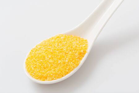 Corn in a spoonの写真素材