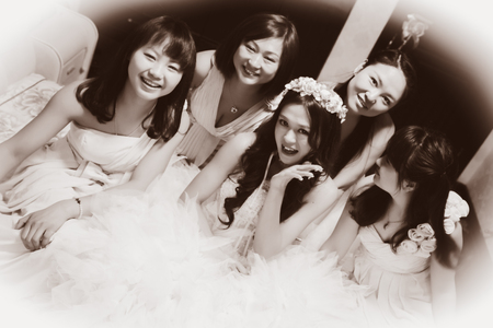 CHINA NANCHANG February 26, 2015: the bride and her bridesmaids taking group photo togetherのeditorial素材