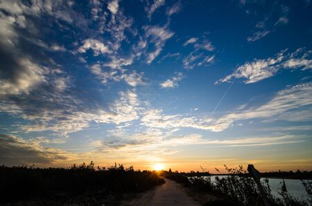 Road and sky in sunset countryside view natureの写真素材
