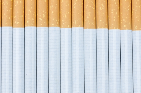 cigarettes with a brown filter macro shot  backgroundの写真素材
