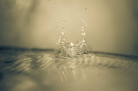 Water splash in the vintage color concept backgroundの写真素材