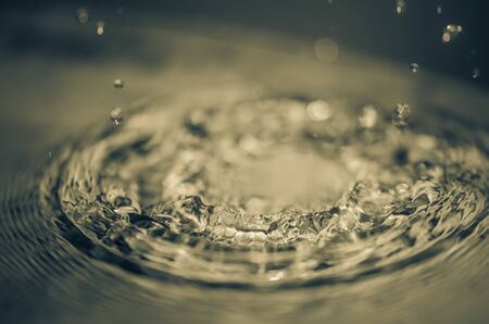 Water splash in the vintage color concept backgroundの写真素材