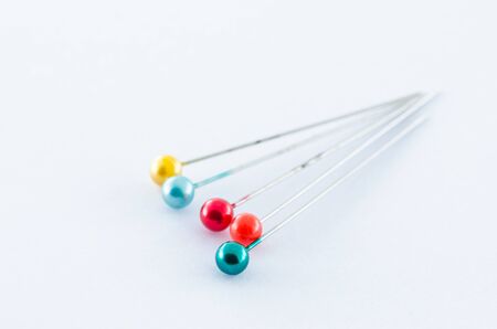 Pin in white background in the embroidery crafts conceptの写真素材