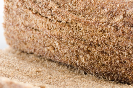 Roll chocolate cake and cream on white backgroundの写真素材