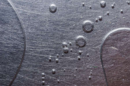 Water drops in aluminium wall background abstract conceptの写真素材