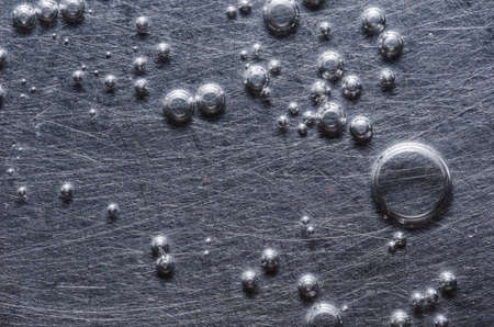 Water drops in aluminium wall background abstract conceptの写真素材