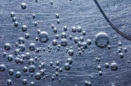 Water drops in aluminium wall background abstract conceptの写真素材
