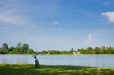 Pond and clouds in spring nature landscape in Thailandの写真素材
