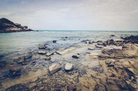 Beach rock and blue sea in Thailand vintage