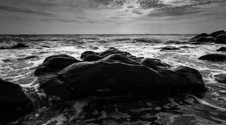 Black and white Beach rock and blue sea in Thailandの写真素材