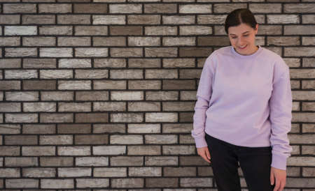 Woman in copy space mockup sweatshirt in Pantone Purple Color of the Year 2022