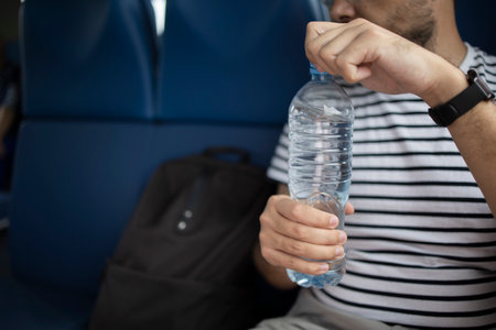 Plastic bottle drinking water a trainの写真素材