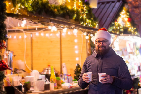 christmas market souvenir shop stall in eveningの写真素材