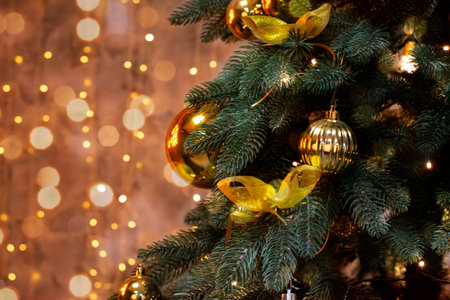 Christmas home room with tree and festive bokeh lighting, blurred holiday backgroundの写真素材