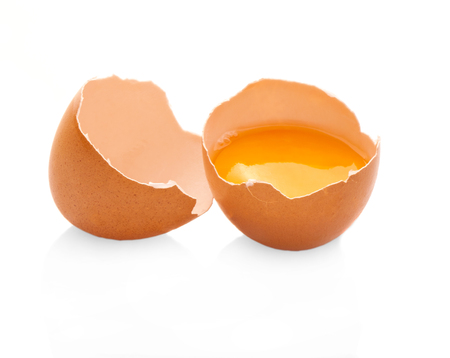 Broken egg isolated on white background