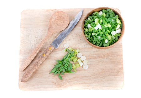 Chopped fresh green onions isolated on white background. Top view
の写真素材