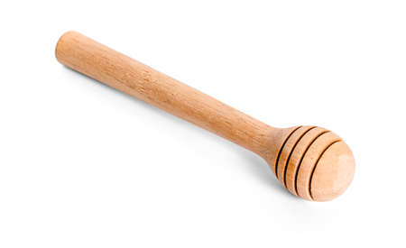 Honey dipper or spoon made from wooden isolated on white background