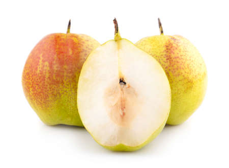 Fresh pears, one and a half yellow fruit isolated on white backgroundの写真素材