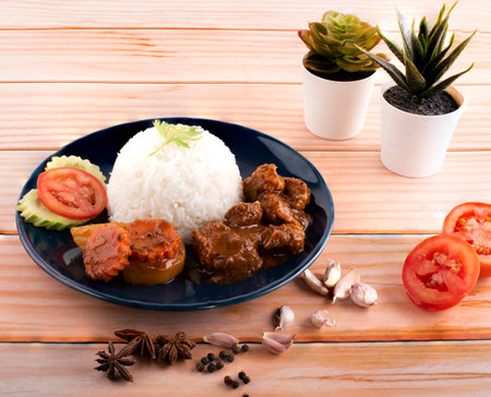 Fried pork with garlic and pepper on rice. Thai popular food style.の写真素材