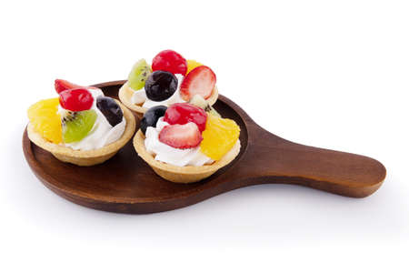 delicious fruit tart made with strawberries,grapes and kiwi.