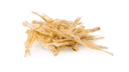 dried engraulidae fish isolated on white backgroundの写真素材