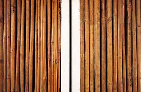 Old bamboo door in the old temple, thailandの写真素材
