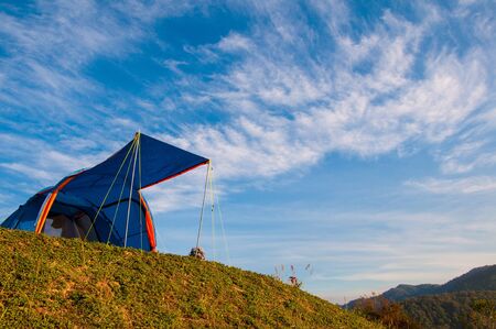 blue tent on the mountainの写真素材